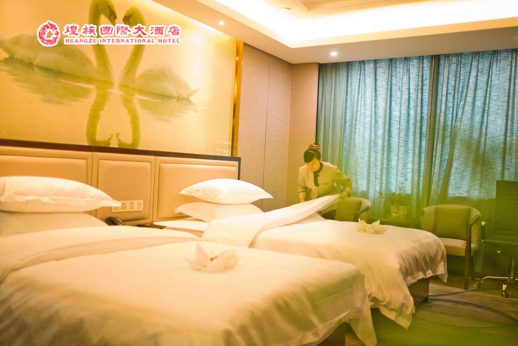 Huangzu International Hotel Huaihua Bagian luar foto
